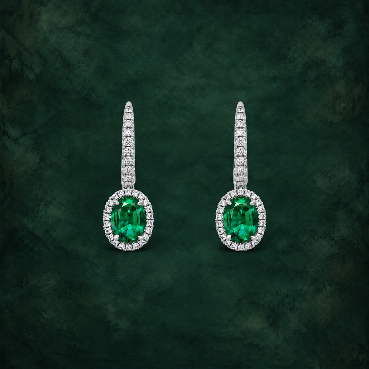 Oval Emerald Halo Studs — Jewellery detail